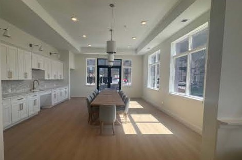 Clean clubhouse kitchen and dining area